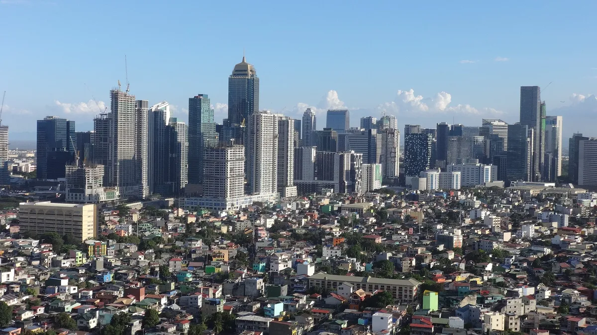 Bonifacio Global City skyline in Taguig, Metro Manila, with high-rise condo towers above low-rise neighborhoods